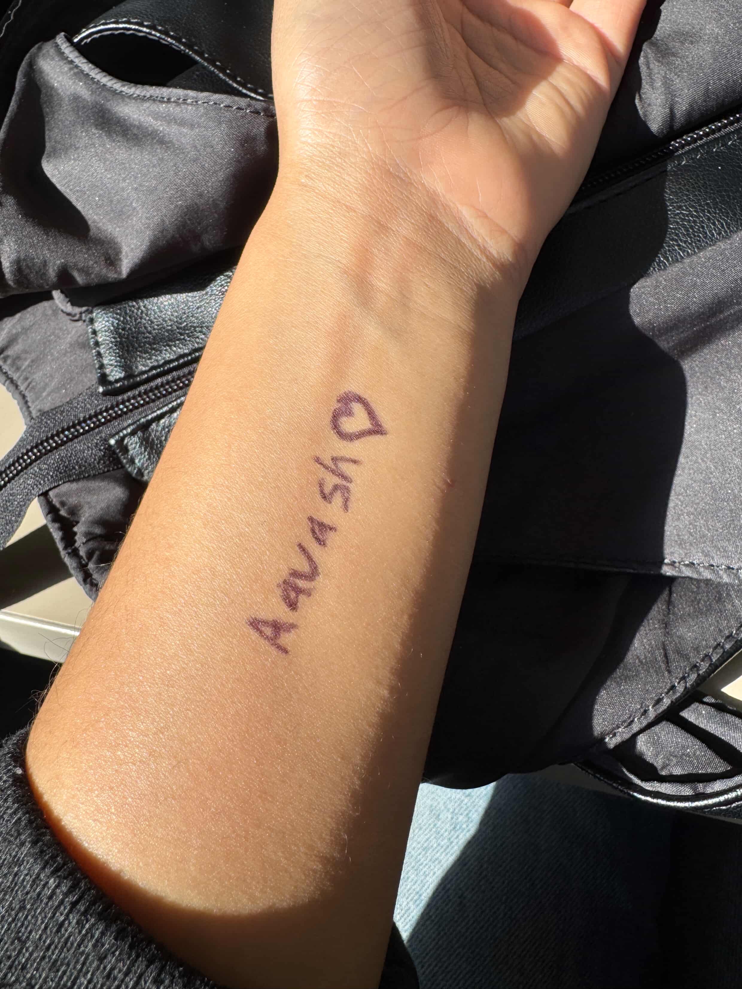 Aavash written on hand